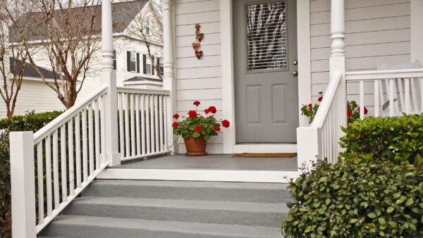 house porch with red flowers